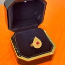 Shahed ring with red gemstone
