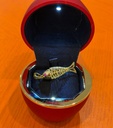 Red-eyed fish pendant #1